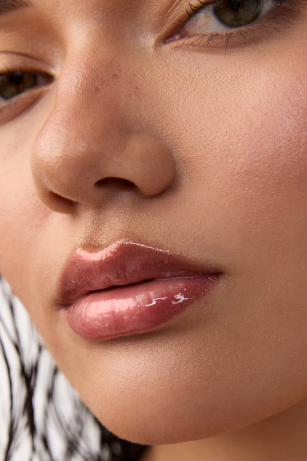 Close-up of a person's lips with a blurred background