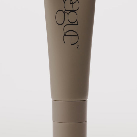 Rose plumping lip serum video to show tube and colour
